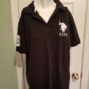 Black polo style shirt.